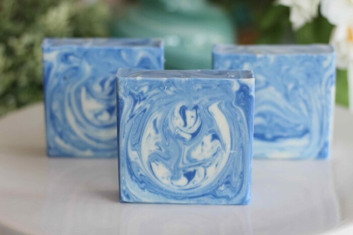 Three Revive soaps without labels, from Elemental Blue