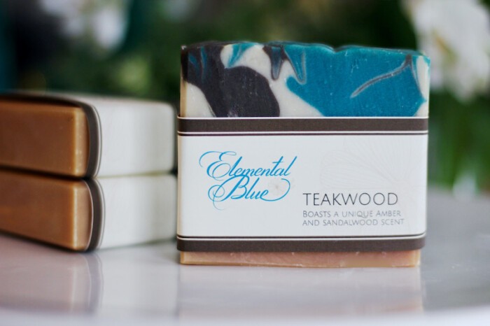 A Teakwood soap with two Teakwood soaps in the background