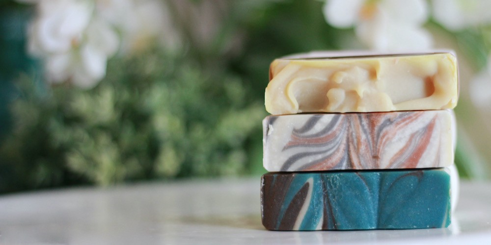 three limited release soaps stacked on top of each other