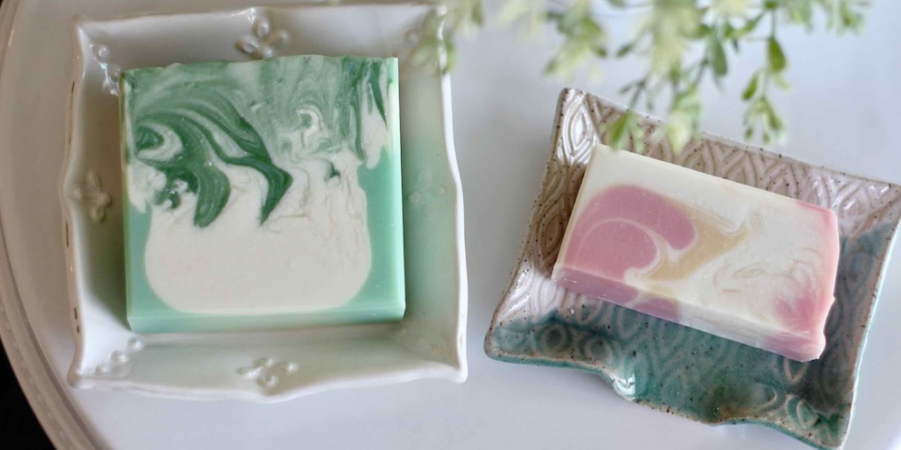 Large and small size soap dishes with soap